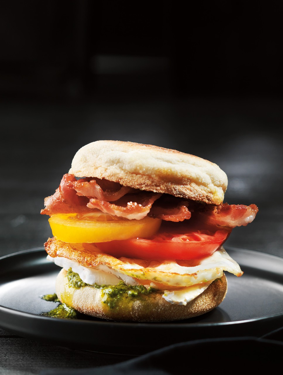 Breakfast Egg, Crispy Bacon, Heirloom Tomatoes & Brie on Toasted English Muffins