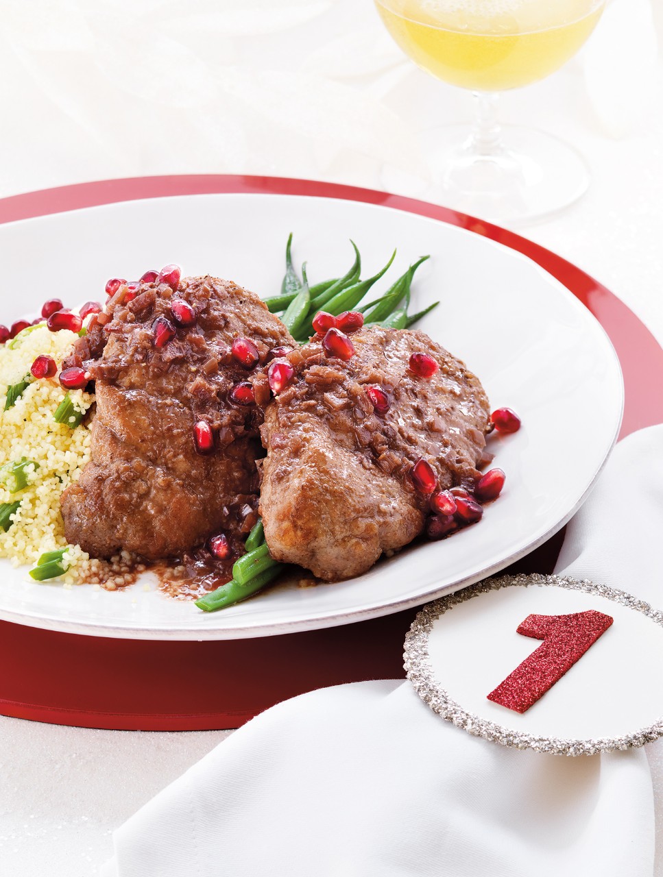 Pomegranate-Glazed Pork Medallions with Couscous