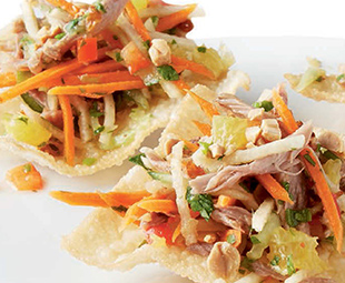 Grand Marnier-Marinated Pulled Duck with Asian-Style Slaw on Crispy Won Tons