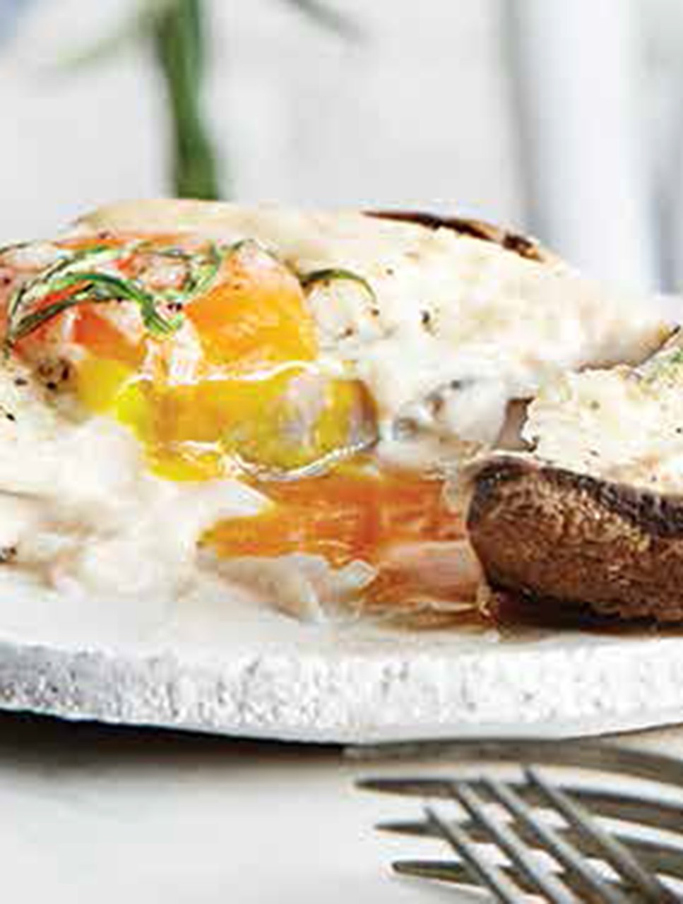 Baked Eggs in Mushroom Caps with Mornay Sauce