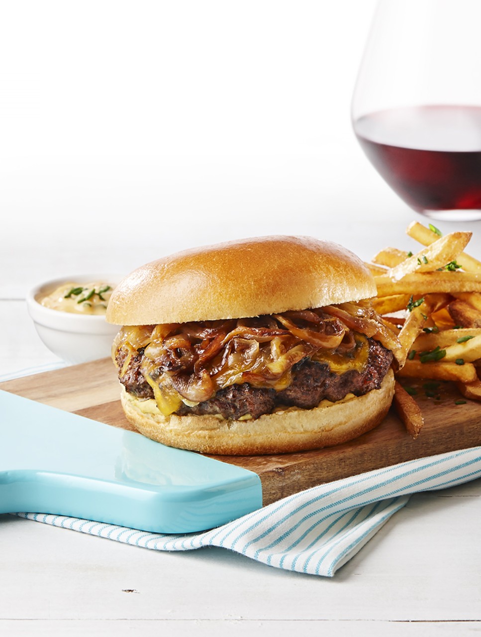 Classic Canadian Burger with Beer-Braised Onions and Cheddar