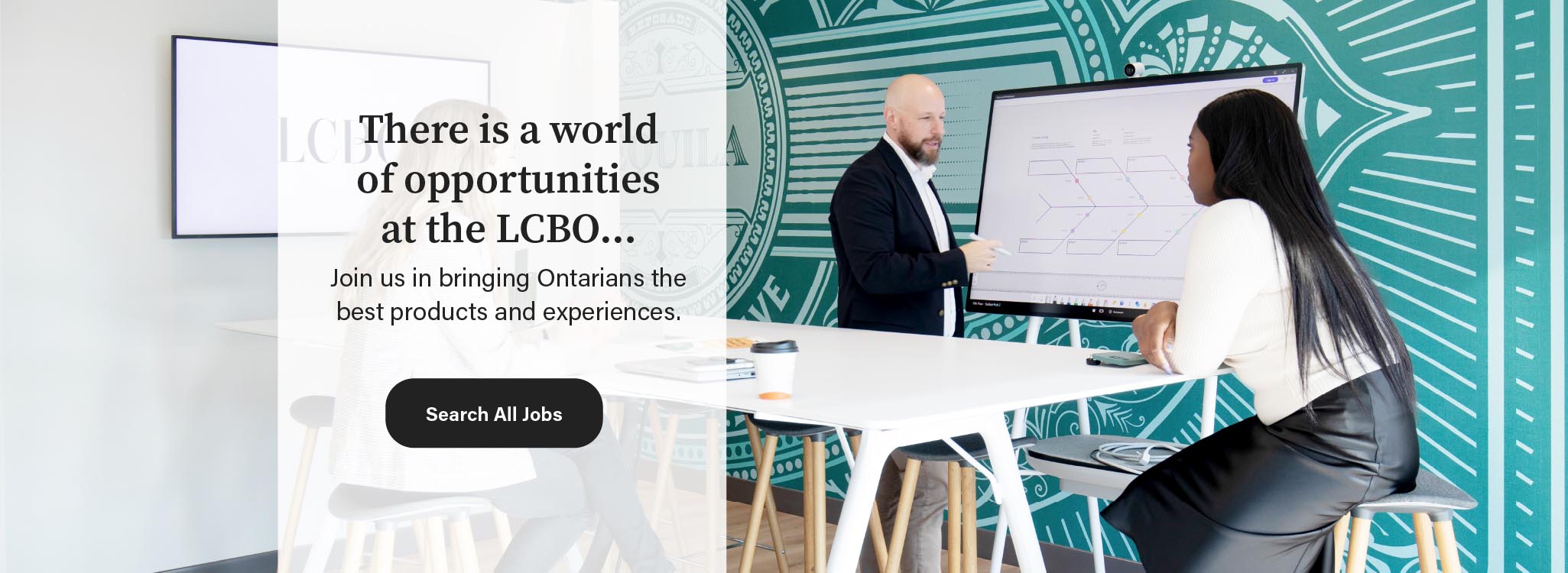 Corporate employee collaborating with two colleagues in front of a white board at LCBO head office. The message is, there is a world of opportunities, all you need to do is click on the link to find available jobs at the LCBO.