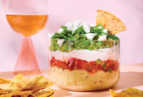 Dips 7-LAYER DIP WITH SPICY BUTTER BEANS & TAJÍN TORTILLAS 